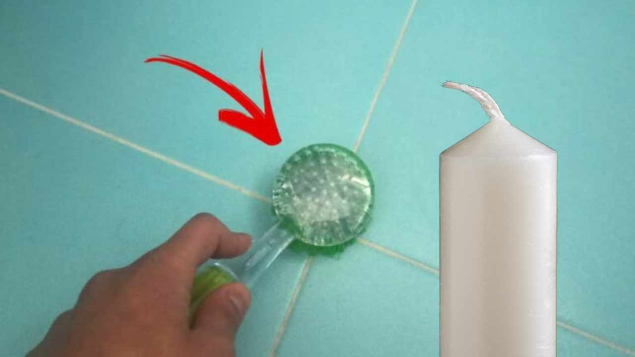El formidable remedio para limpiar la lechada del suelo: corre a buscar una vela